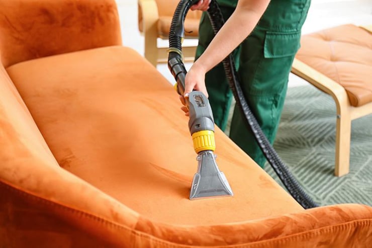 Professional upholstery steam cleaning of a fabric sofa &mdash; the kind of job we do weekly across Co. Carlow